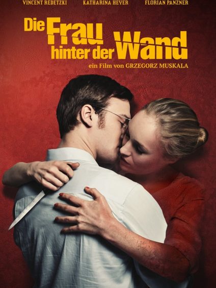 DIE FRAU HINTER DER WAND